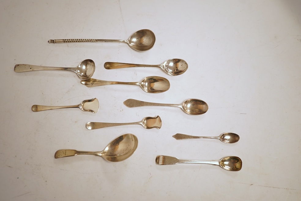 A small collection of nine assorted Georgian and later small silver or white metal spoons, including mustard ladles and other condiment spoons, a caddy spoon, London, 1799, together with a 19th century Russian 84 zolotni